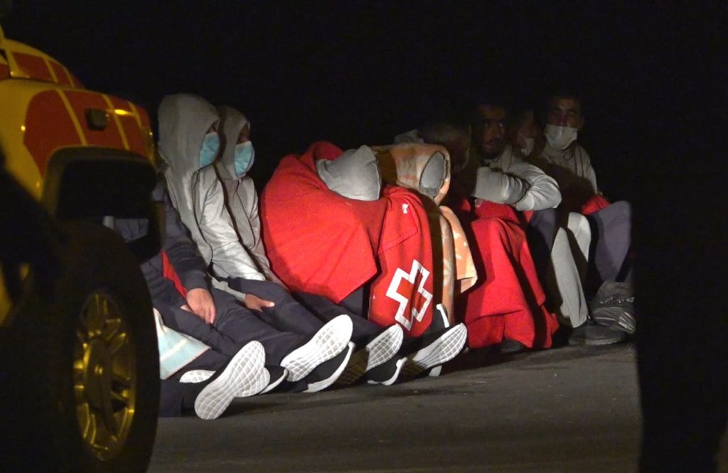 63 Migranten